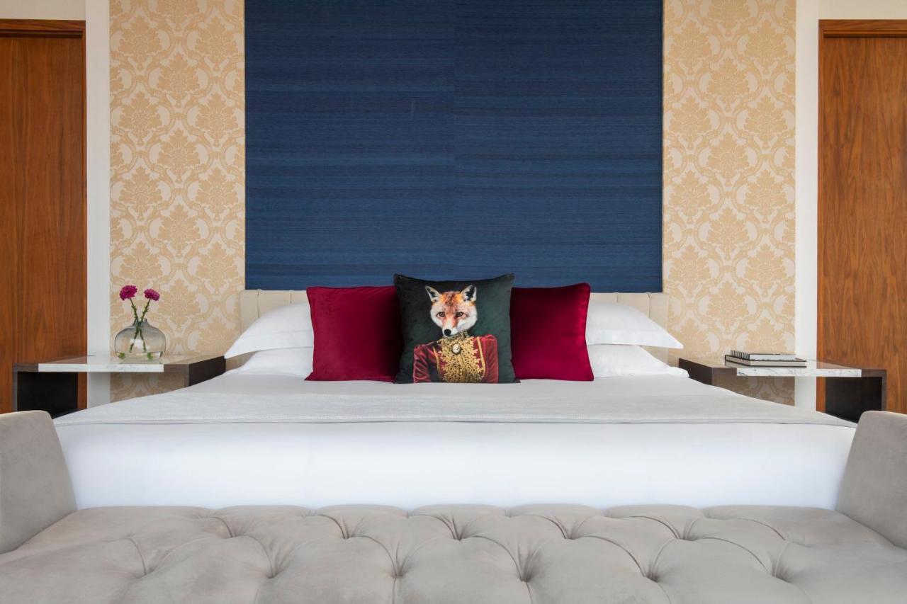 Abesq Doha Hotel And Residences, An Ihg Hotel Exterior photo A bedroom at the hotel