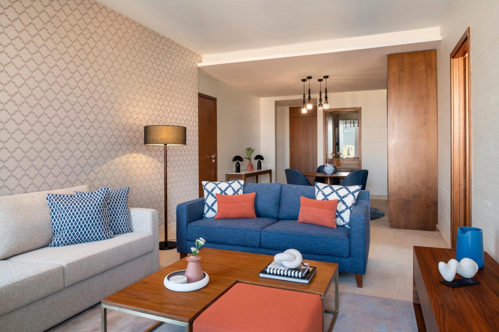 Abesq Doha Hotel And Residences, An Ihg Hotel Exterior photo A living room at the hotel
