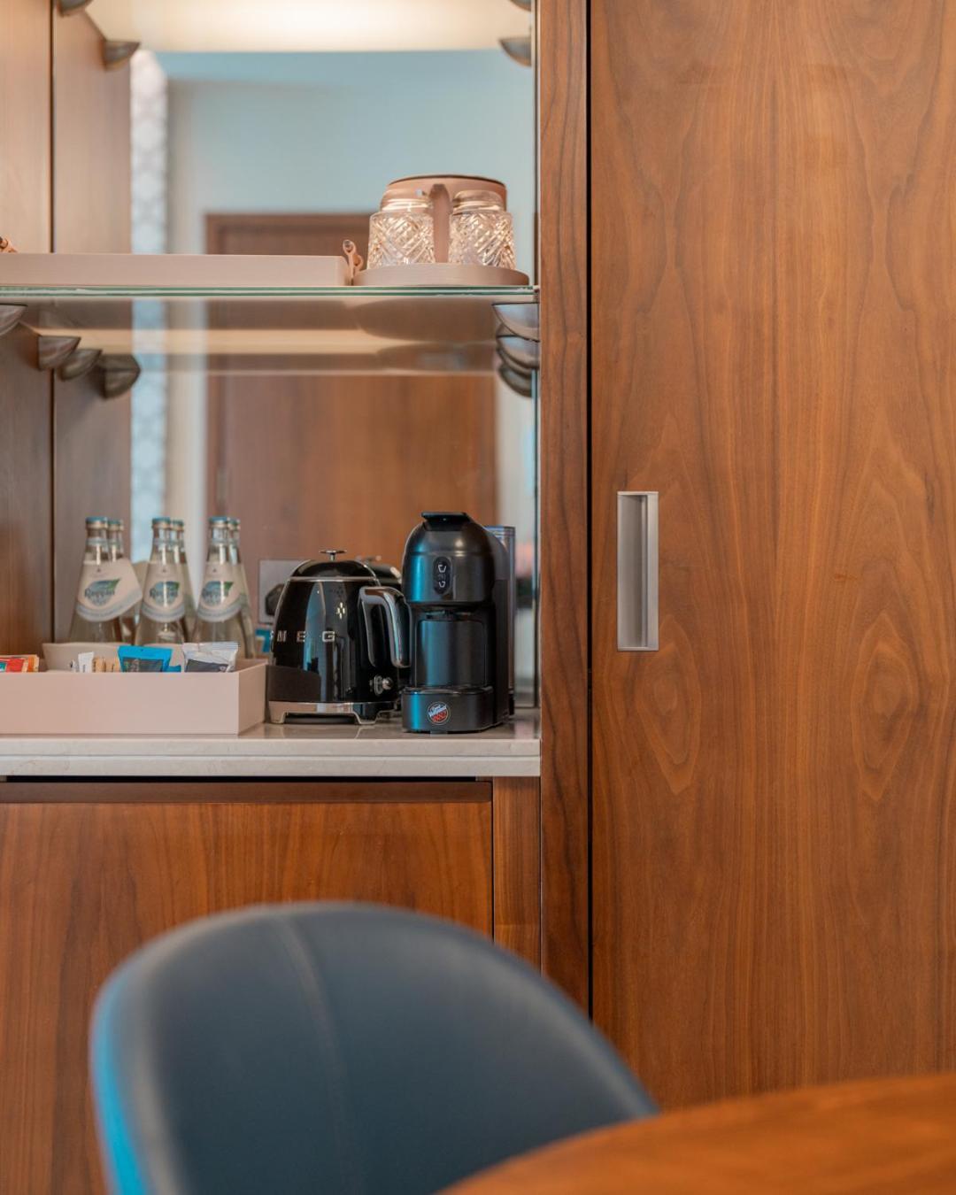 Abesq Doha Hotel And Residences, An Ihg Hotel Exterior photo A Nespresso machine on board a plane